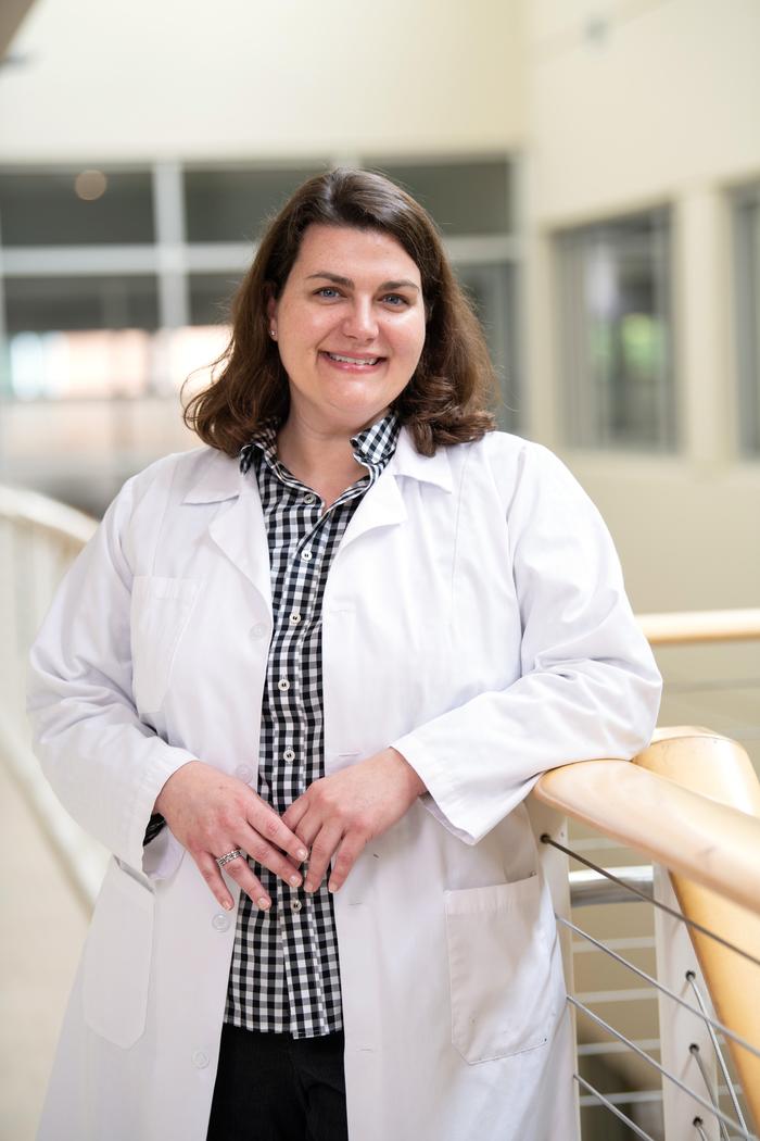 A nursing student looking at the camera for a photo.